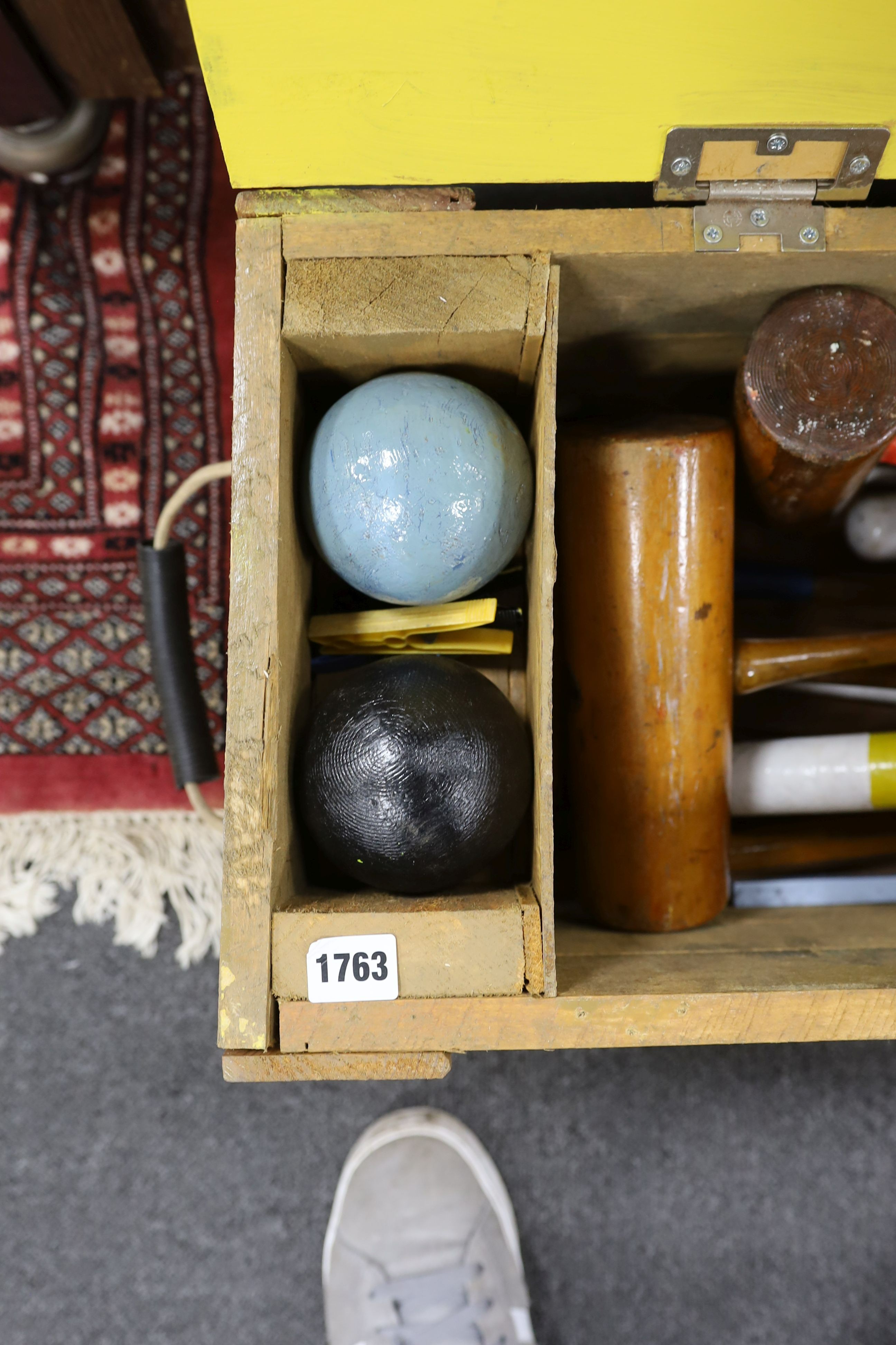 A vintage matched croquet set in later case